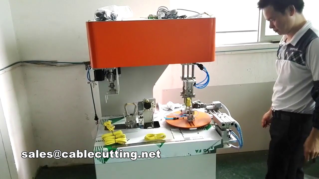 Machine automatique d'enroulement et de ligaturage de câbles