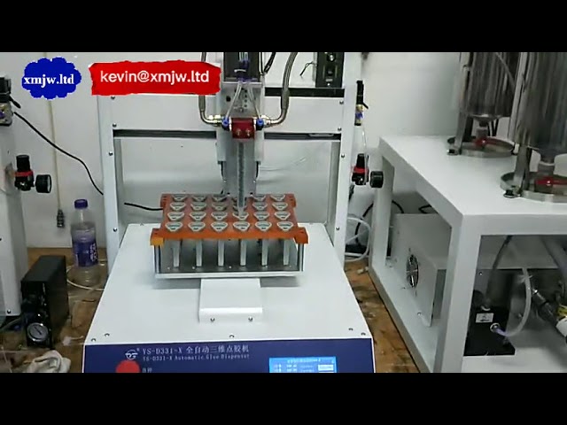 Machine automatique de dosage et d'enrobage de résine époxy