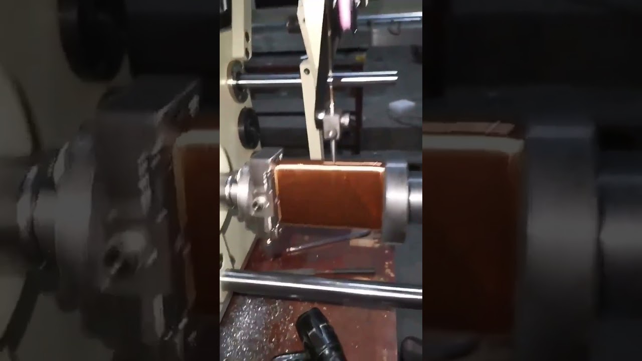 Machine de bobinage automatique à axe unique pour bobines d'horloge et moteurs
